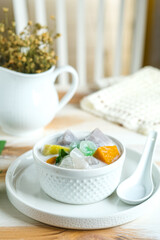 bubur cha cha is Indonesian dessert made from taro, coconut milk, tapioca jelly, sweet potato and palm seed
