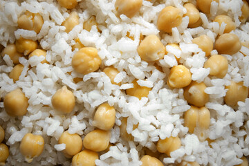 Close up view of white rice cooked with chickpeas