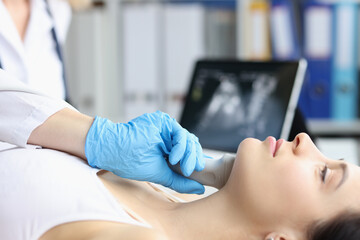 Ultrasound of the soft tissues of face of woman in medical office