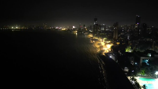 swimming pool wide view beside the Dadar chowpatty beach night bird eye view mumbai