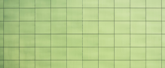 Beautiful greenish toilet, kitchen, bathroom - smooth square tiles close-up. Light green texture of wall, floor, ceiling closely with copy space. Easy green sleek facing tile of building wall.