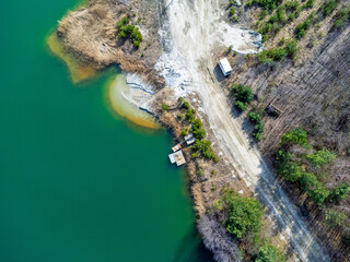 Aerial view landscape. Green water, coast, sand, marina, drone photo. 