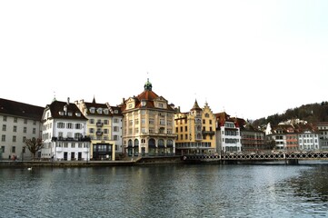 View of Lucerne with the bridge, Wasserturm Tower and the Church of the Jesuits, Lucerne, Switzerland.