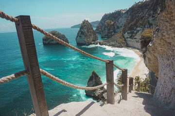 Staircase leading down to the beach on Nusa Penida island.