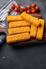 fish stick deep-fried seafood breadcrumbs fast food meal food snack on the table copy space food background rustic top view