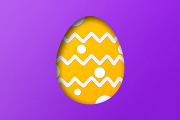 Purple and yellow paper cuts form an Easter egg pattern. overlay paper