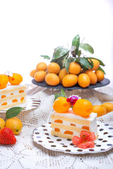 Mayongchid or marian plum cake look so delicious. Summer fruit cake. Sweet yellow marian plum cheesecake.