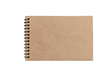 Open spring notepad with craft brown sheets. Creativity and drawing. Close-up. Isolated on white...