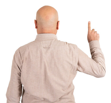 Transparent png image caucasian bald man back view of pointing finger up. Pushing invisible button concept idea. Isolated white background, copy space. Pretending using touc screen, look up.