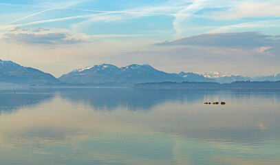 view over Chiemsee lake with the alps at the horizon