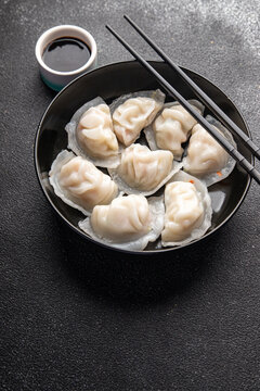 dumplings dim sum rice flour dough Chinese food meal snack on the table copy space food background rustic top view