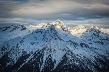 The Dolomites mountains in beautiful winter day. Pinzolo ski resort, Italy. January 2023