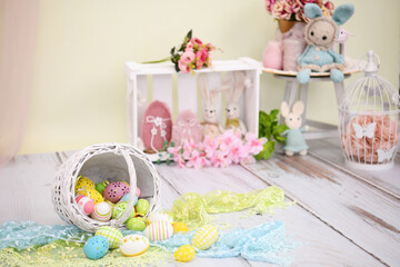 Easter decoration with bunnies and Easter eggs - 584694262