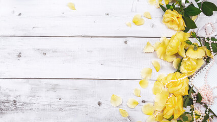 Yellow rose petals. Valentine's day or Mother's day background. Flat lay. Top view. Copy space