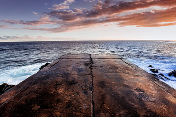 Jetty and lighthouse in Saint-Pierre, La Reunion island