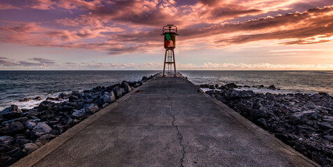 Jetty and lighthouse in Saint-Pierre, La Reunion island