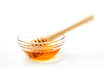 Honey bowl and dipper isolated on white background as package design element