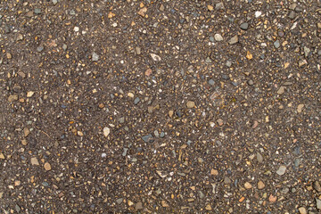 Rough gray asphalt on the sidewalk as a texture, pattern, background