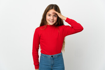 Little girl over isolated white background saluting with hand with happy expression