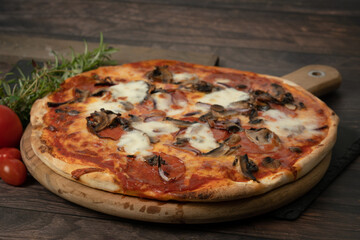 Homemade Pizza with mozzarella and mushrooms
