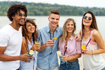 Portrait of friends having fun together on beach vacation. Student friend fun happiness concept.