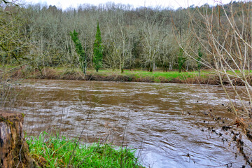 River Vezere in France showing high water levels following heavy rain after a period of drought

