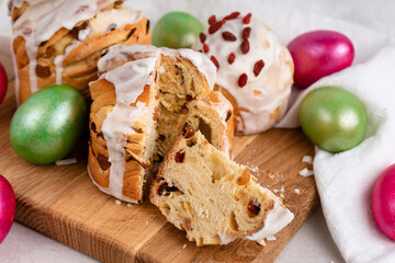Easter cruffin cakes and colored Easter eggs beautifully arranged on board