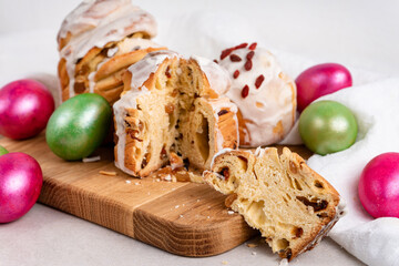 Easter cruffin cakes and colored Easter eggs beautifully arranged on board