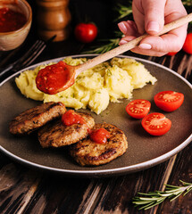 grandma cooked cutlets with mashed potatoes