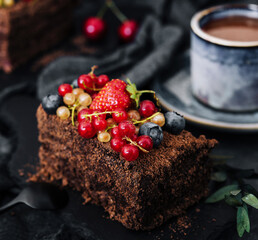 Delicious chocolate cake decorated with fresh berries