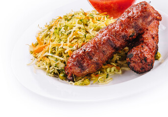 Moldavian Traditional Mititei Mici Meat Sticks with Cabbage and a Sauce