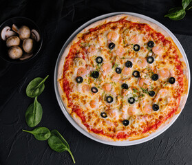 Seafood pizza with shrimps top view