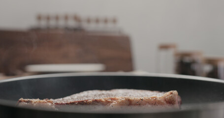 new york steak on nonstick pan