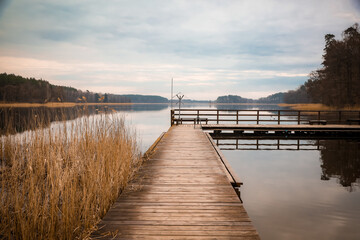 Naklejka premium pier at sunset. Warmia - Mazury - Poland