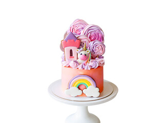 Cute pink birthday cake for a little girl with fondant unicorn, with gingerbread cookies isolated on white background, horizontal orientation