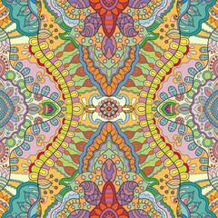 Hand drawn seamless graphic pattern, colorful artistic background with floral and geometric elements. Doodle ethnic mandala ornament for textile fabric, paper print. Surface texture 