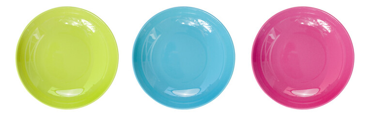 Top view of empty colorful plates isolate on white background