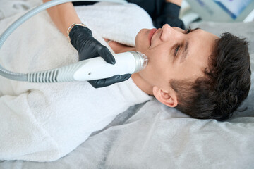 Obraz na płótnie Canvas Dermatologist doing facial skin rejuvenation procedure for man