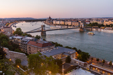 Evening view of Danube river with Szechenyi Lanchid bridge in Budapest, Hungary