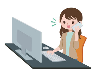 パソコンの前で電話をする女性　私服