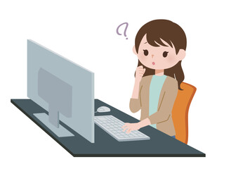 パソコンの前で困っている女性　私服