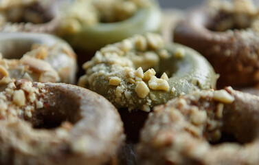 Glazed donuts with peanuts and pistaccio