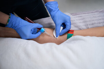 Doctor taking blood for blood test in hospital