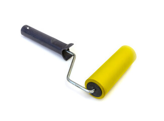 Tool, roller for smoothing wallpaper yellow on white background