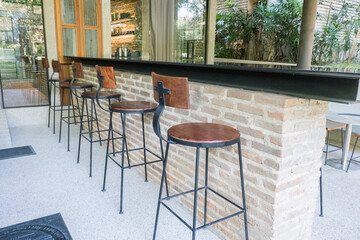 Circular metal table and chair at restaurant.