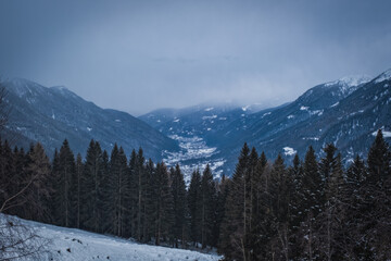 Cloudy day on famous Italian Alps Brenta Dolomites, snow on the slopes of the Alps Madonna di Campiglio, Pinzolo, Italy. Ski resorts in Italy. January 2023