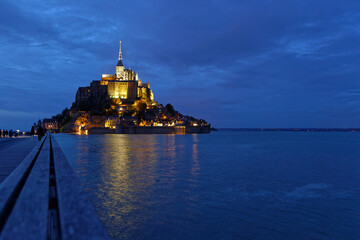 MONT SAINT-MICHEL, FRANCE, September 28, 2019 : Blue hour on the Mont Saint-Michel Abbey and its...