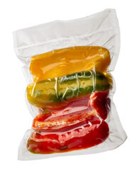 Slices of yellow red and green peppers in vacuum-sealed package for sous vide cooking isolated