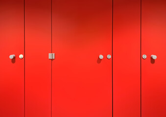Red doors in the room.