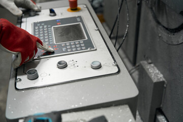 Man working on electronic machine in the workshop